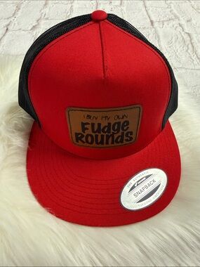 The Classic Red & Black Trucker Hat with 'Fudge Rounds' Patch. Unisex